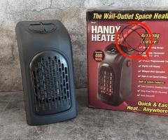 KOMPAKTOWY MINI GRZEJNIK ELEKTRYCZNY 400W DO GNIAZDKA Z WENTYLATOREM
