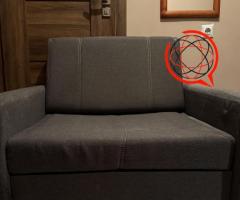 Fotel z funkcją łóżka rozkładanego z pojemnikiem na pościel